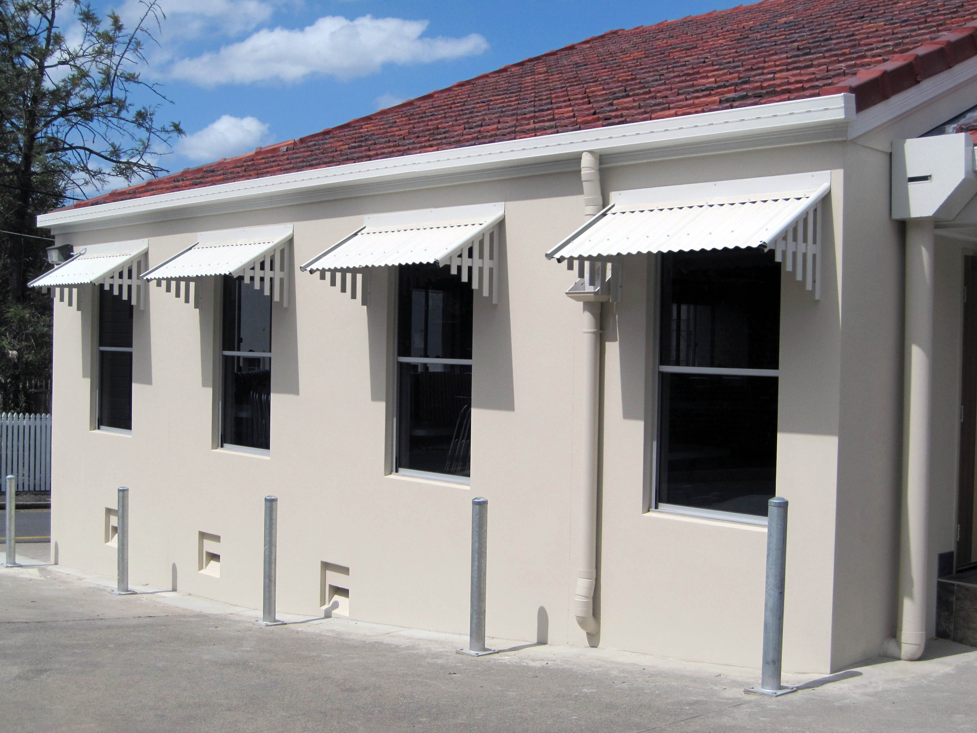 Four Window Hoods in Surfmist with Gable Rolls